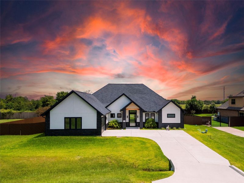 Front exterior of a new home in , Hockley, TX, highlighting curb appeal (Image 2). Front exterior of a new home in , Hockley, TX, highlighting curb appeal (Image 2).