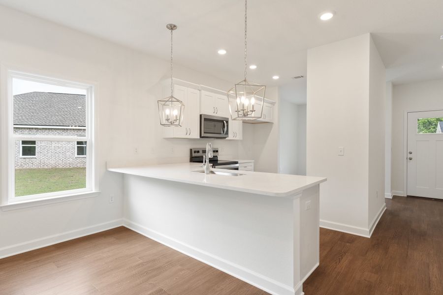 Furnished interior in a model home at Homewood Estates in Crestview (Image 5).