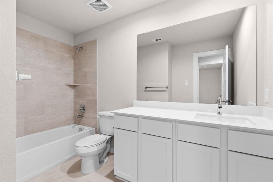 Furnished interior view inside a new home in Cypresswood Landing, Humble (Image 12).