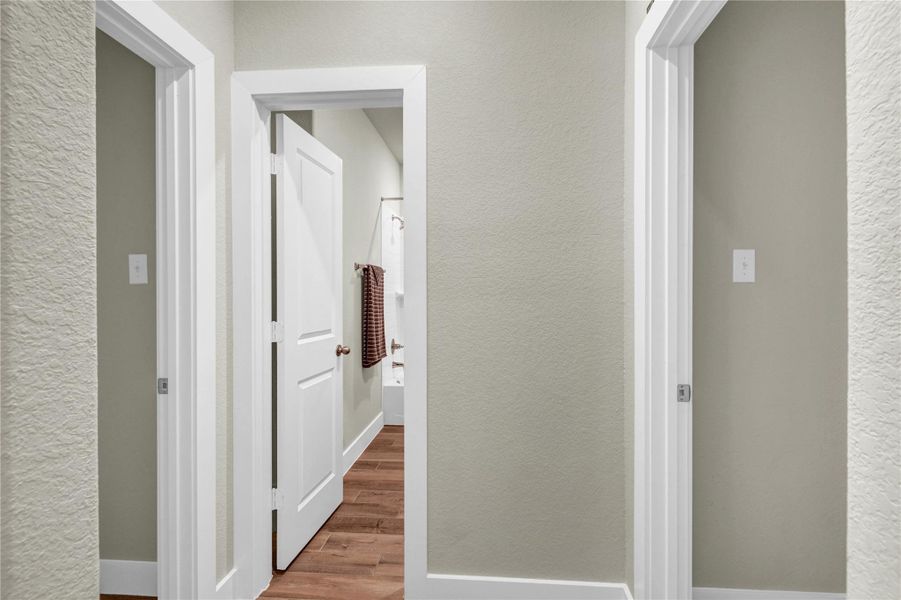 Secondary bath entrance located between the secondary bedrooms Secondary bath entrance located between the secondary bedrooms