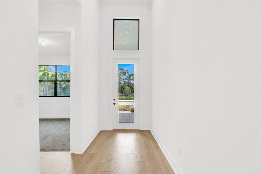 Spacious, unfurnished interior of a new home in Cove Royale, Stuart (Image 32).