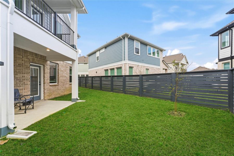 Fully fenced yard offering privacy and space for outdoor activities.