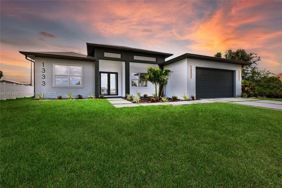Front exterior of a new home in , Cape Coral, FL, highlighting curb appeal (Image 20). Front exterior of a new home in , Cape Coral, FL, highlighting curb appeal (Image 20).