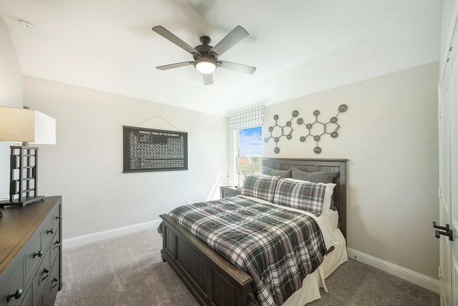 Furnished interior view inside a new home in Ellwood, Iowa Colony (Image 10).