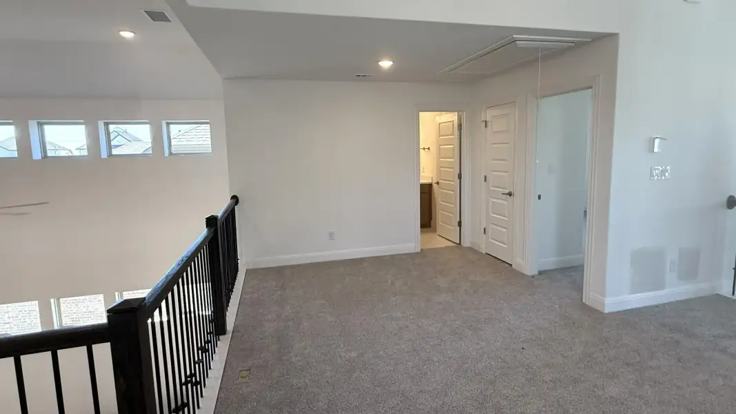 Furnished interior view inside a new home in Flora, Hutto (Image 13).