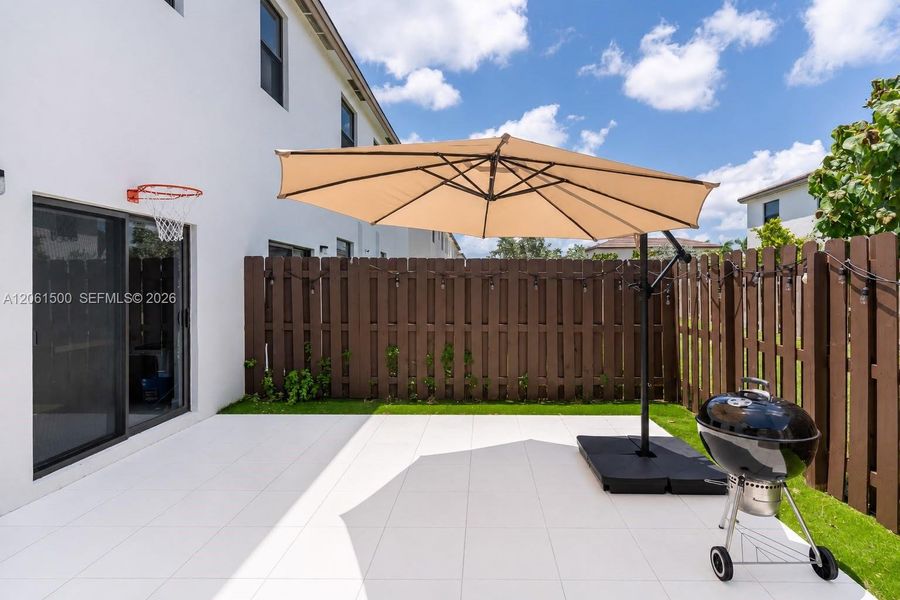Exterior details and patio area of a home in , Miami (Image 3). Exterior details and patio area of a home in , Miami (Image 3).