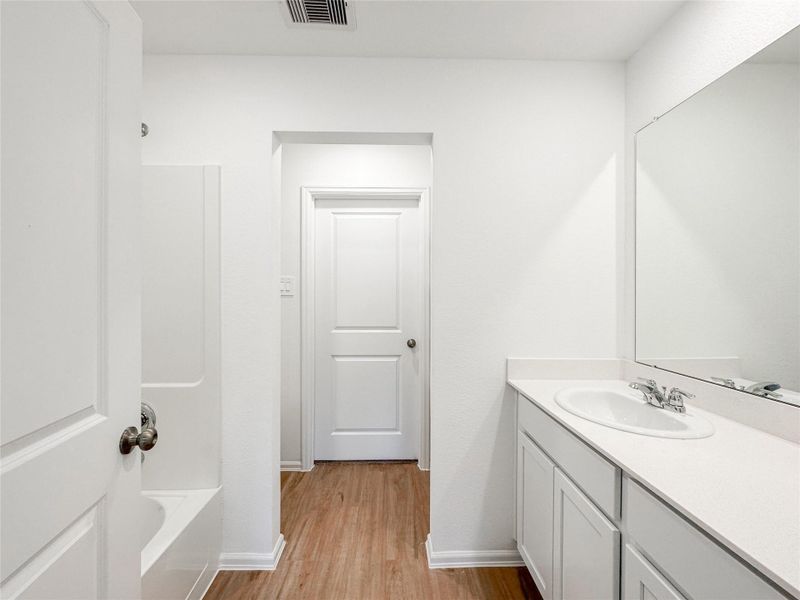 Furnished interior view inside a new home in Ladera Trails: Cottage Collection, Conroe (Image 7). Furnished interior view inside a new home in Ladera Trails: Cottage Collection, Conroe (Image 7).