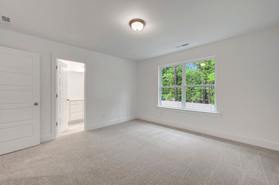 Spacious, unfurnished interior of a new home in Ashmore Townes, Garner (Image 24). Spacious, unfurnished interior of a new home in Ashmore Townes, Garner (Image 24).