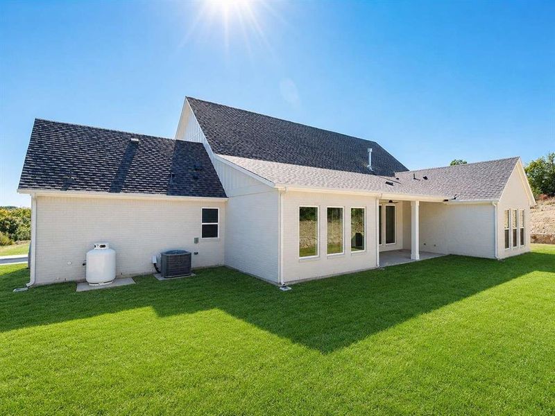 Exterior details and patio area of a home in , Weatherford (Image 3).