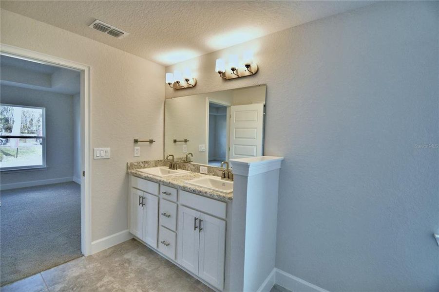 Furnished interior view inside a new home in Cadence Crossing, Auburndale (Image 5). Furnished interior view inside a new home in Cadence Crossing, Auburndale (Image 5).