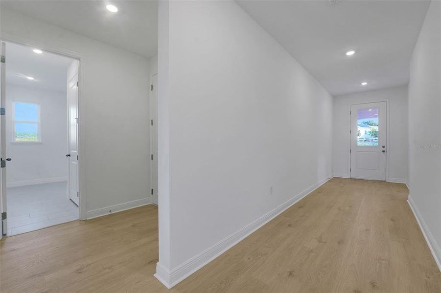 Spacious, unfurnished interior of a new home in Green Key Village, Lady Lake (Image 25).