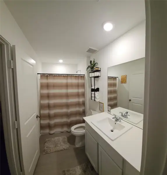 Furnished interior view inside a new home in Tavola, New Caney (Image 9).