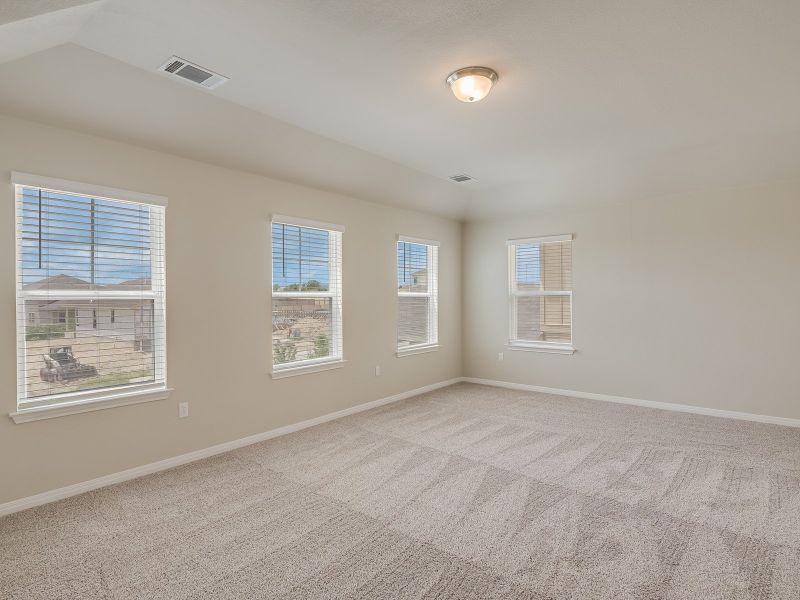 Spacious, unfurnished interior of a new home in Turner's Crossing - Reserve Collection, Buda (Image 11).