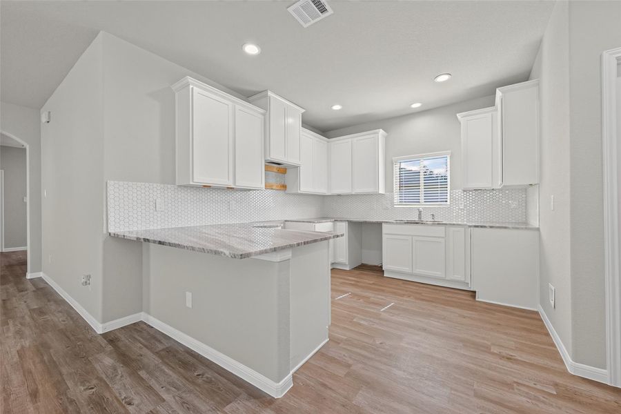 Furnished interior view inside a new home in Woodland Lakes, Huffman (Image 5).