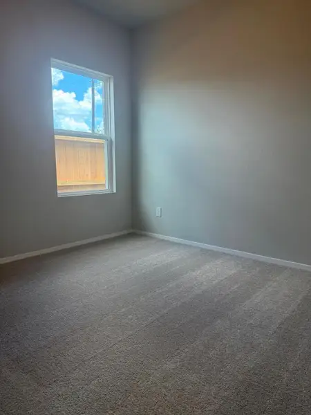 Spacious, unfurnished interior of a new home in Sorella, Tomball (Image 25).