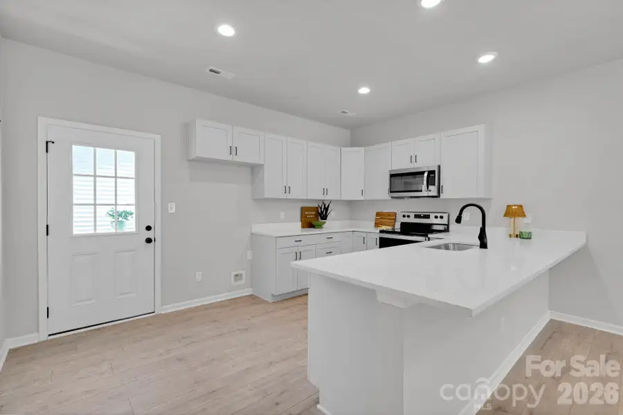 Furnished interior view inside a new home in , Concord (Image 10).