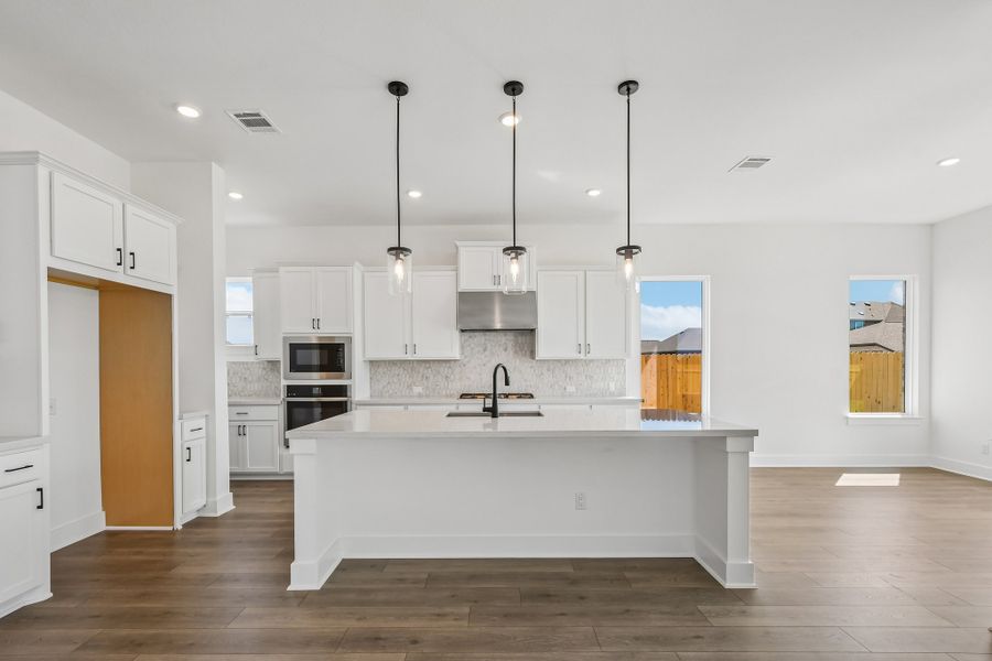 Furnished interior view inside a new home in Santa Rita Ranch, Liberty Hill (Image 6). Furnished interior view inside a new home in Santa Rita Ranch, Liberty Hill (Image 6).