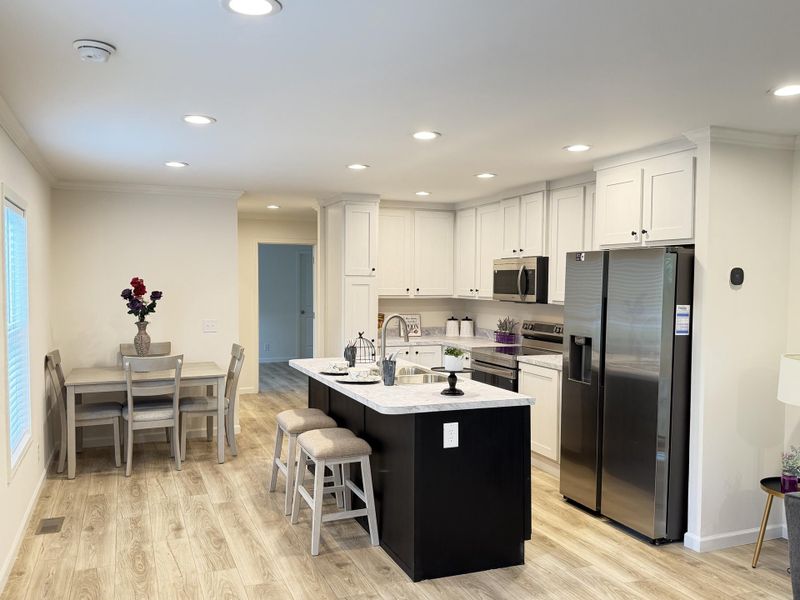 Furnished interior view inside a new home in , North Charleston (Image 15).