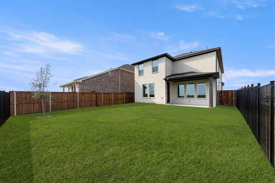 Front exterior of a new home in Creekview Fossil Ridge, Pilot Point, TX, highlighting curb appeal (Image 19).