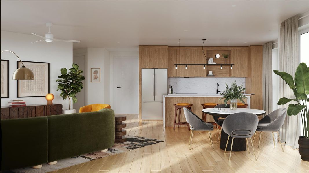 An open floor plan shown in the Shady Grove finish palette, fully furnished with Williams Sonoma selections featuring hotel level fabrics and curated accents throughout.