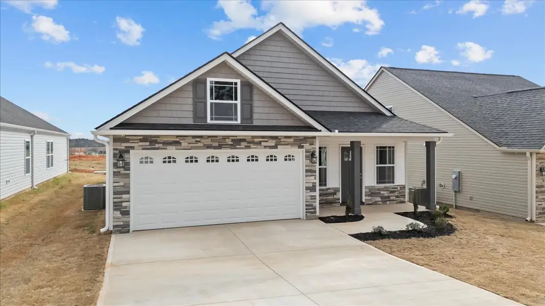 Representative exterior photo of a completed home built from the Ellison by Enchanted Homes in Mills Gin, Campobello, SC (Image 2).