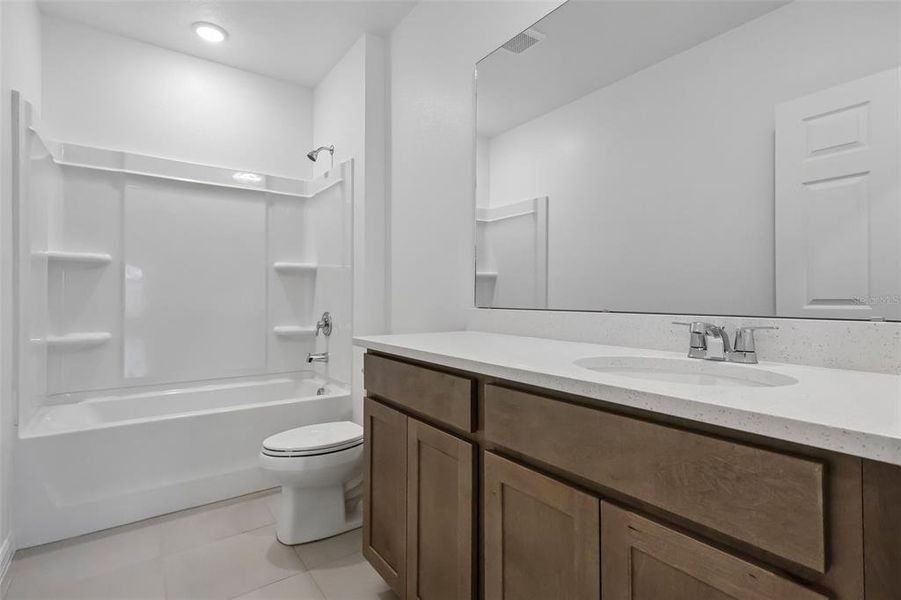 Furnished interior view inside a new home in Eagletail Landings, Howey-in-the-Hills (Image 11).
