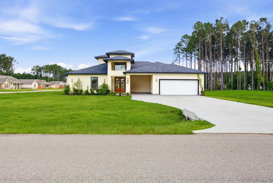 Front exterior of a new home in , Dayton, TX, highlighting curb appeal (Image 26). Front exterior of a new home in , Dayton, TX, highlighting curb appeal (Image 26).