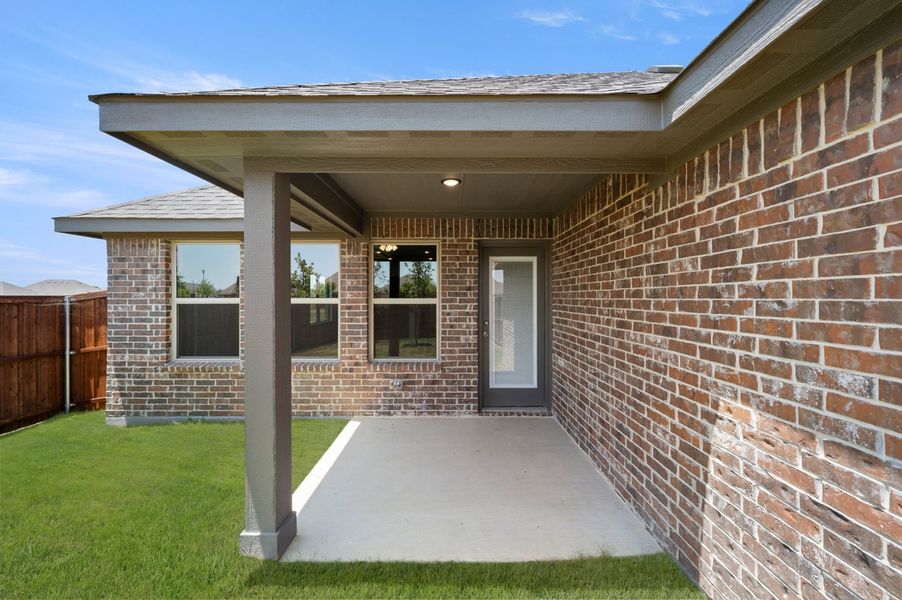 Front exterior of a new home in Redden Farms, Midlothian, TX, highlighting curb appeal (Image 28). Front exterior of a new home in Redden Farms, Midlothian, TX, highlighting curb appeal (Image 28).
