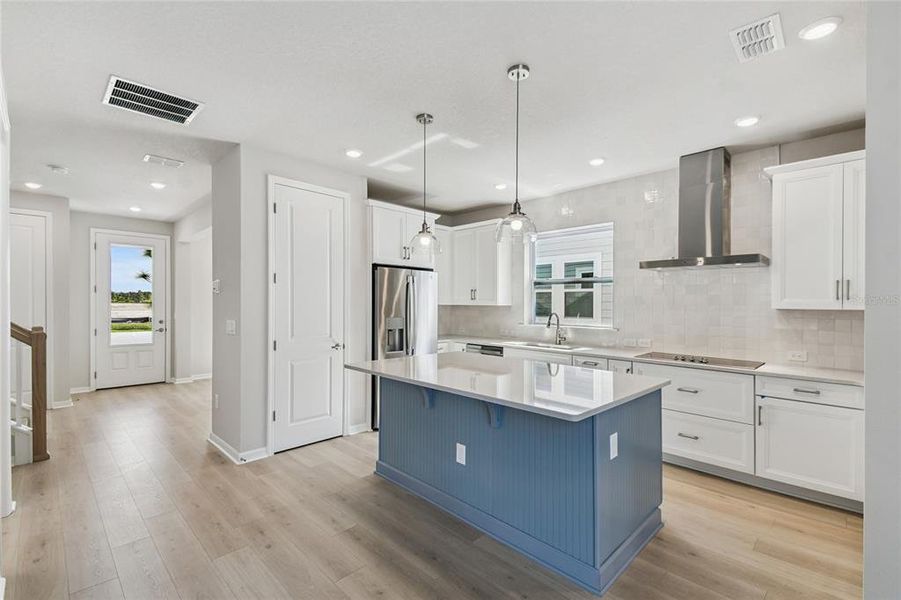 Furnished interior view inside a new home in Weslyn Park in Sunbridge 34', St. Cloud (Image 8).