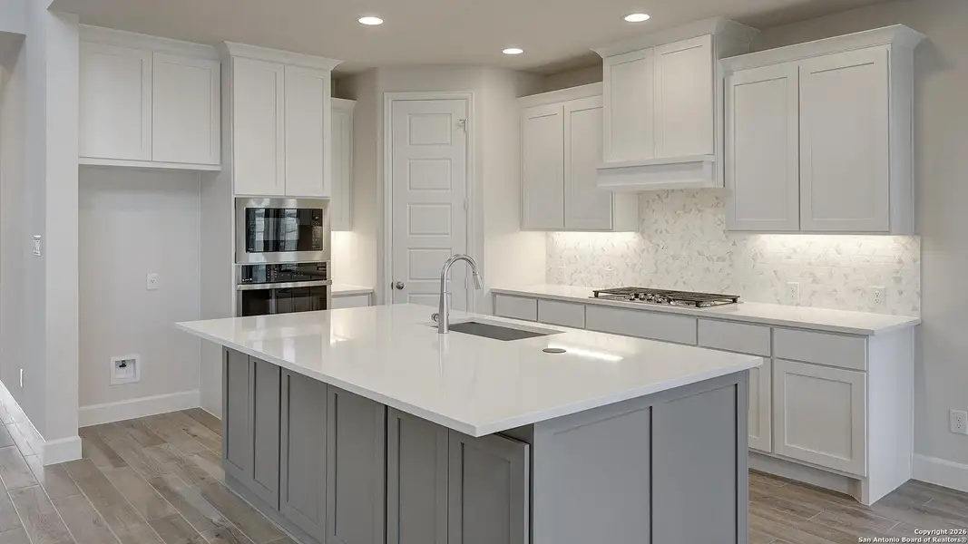 Furnished interior view inside a new home in Ladera 50', San Antonio (Image 6).
