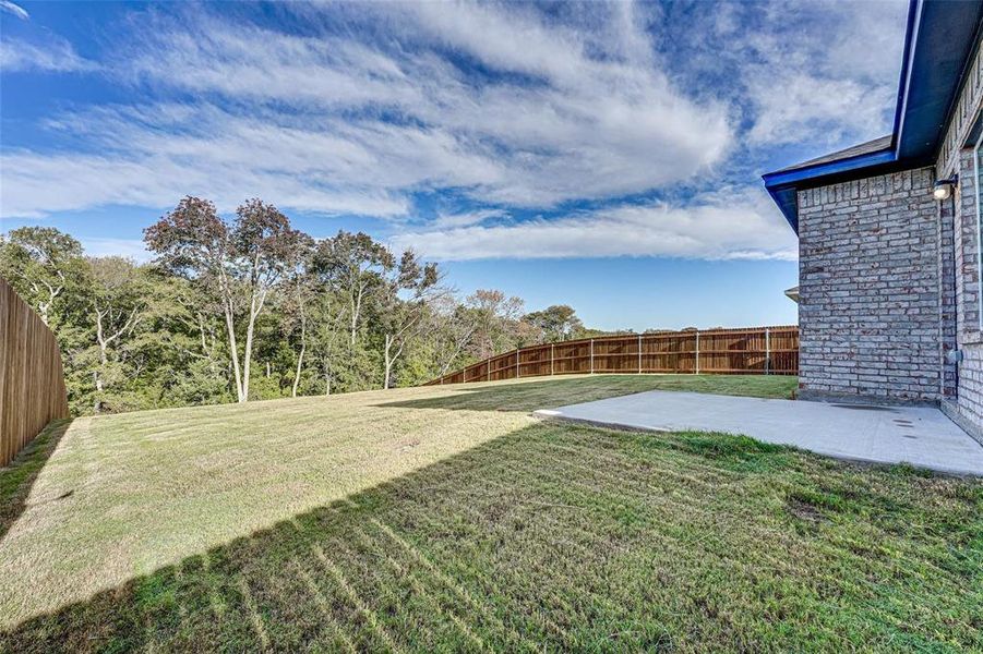 Exterior details and patio area of a home in The Grove, Sherman (Image 2). Exterior details and patio area of a home in The Grove, Sherman (Image 2).