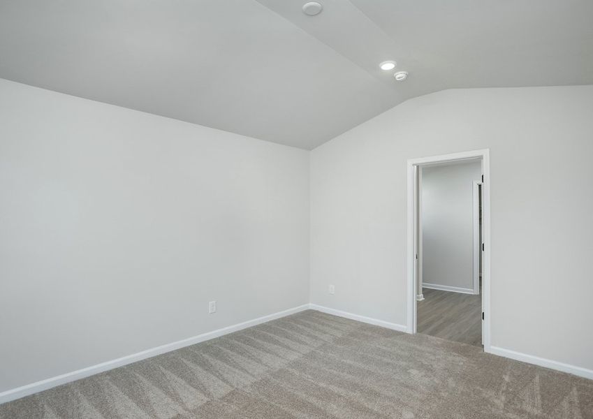 Enjoy unwinding in after a long day in the master bedroom.