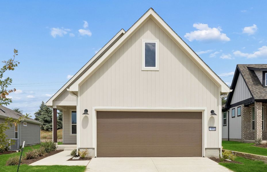 Front exterior of a new home in Sun City Texas, Georgetown, TX, highlighting curb appeal (Image 16). Front exterior of a new home in Sun City Texas, Georgetown, TX, highlighting curb appeal (Image 16).