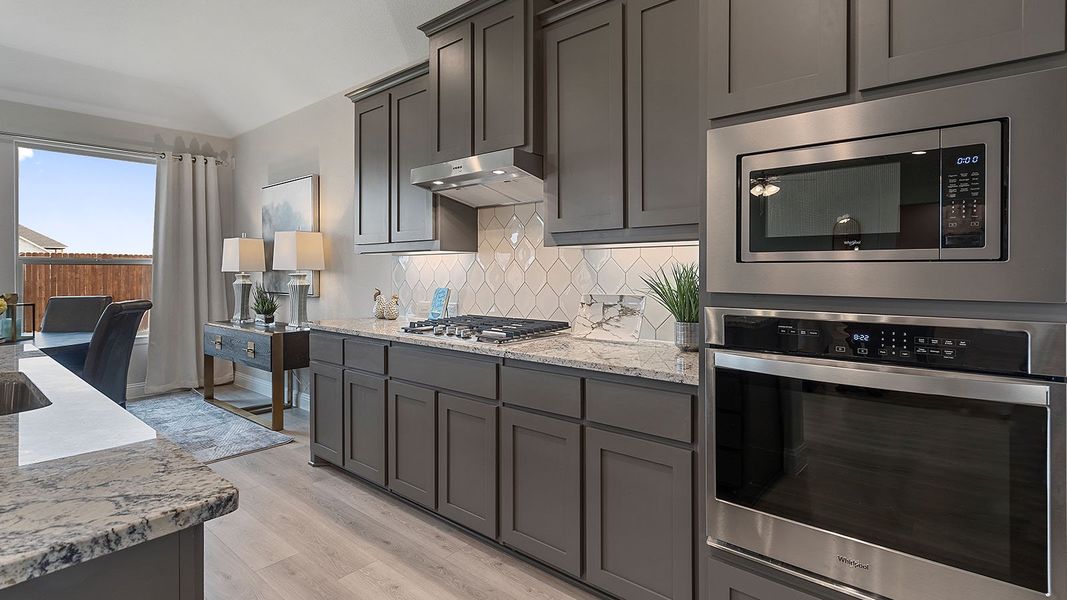 Representative furnished interior of a home built from the Guadalupe by D.R. Horton in Lakeview Pointe, Grand Prairie (Image 10).