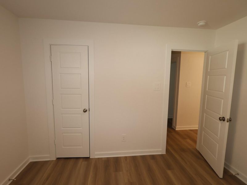 Spacious, unfurnished interior of a new home in Pinewood at Grand Texas, New Caney (Image 4).