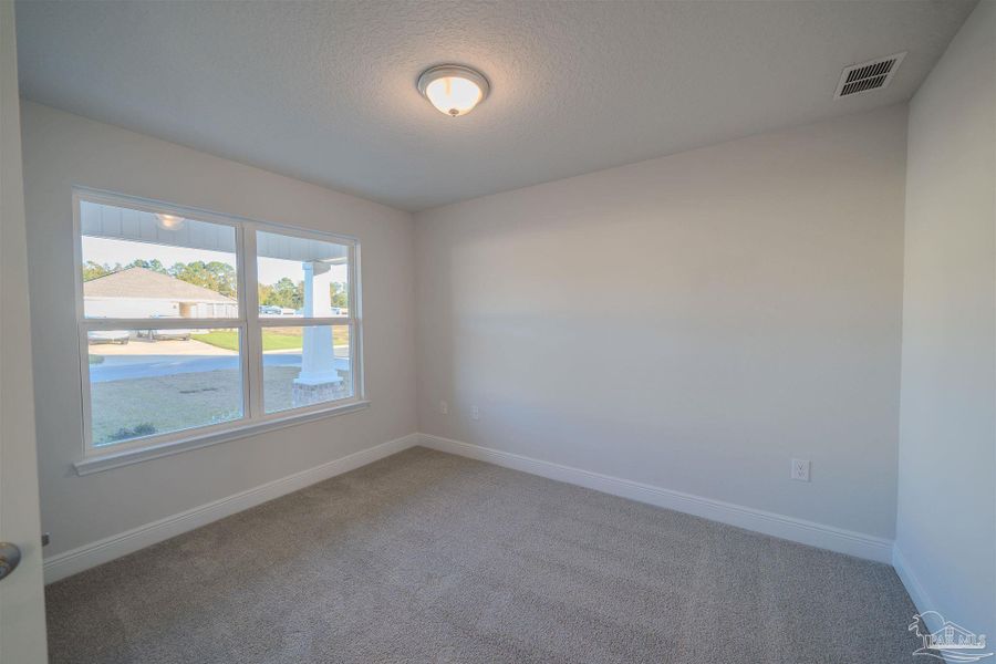 Spacious, unfurnished interior of a new home in Pine Top, Cantonment (Image 12).