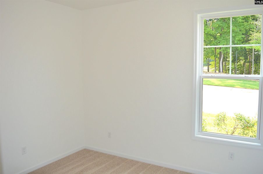 Spacious, unfurnished interior of a new home in Bickley Station, Irmo (Image 17).