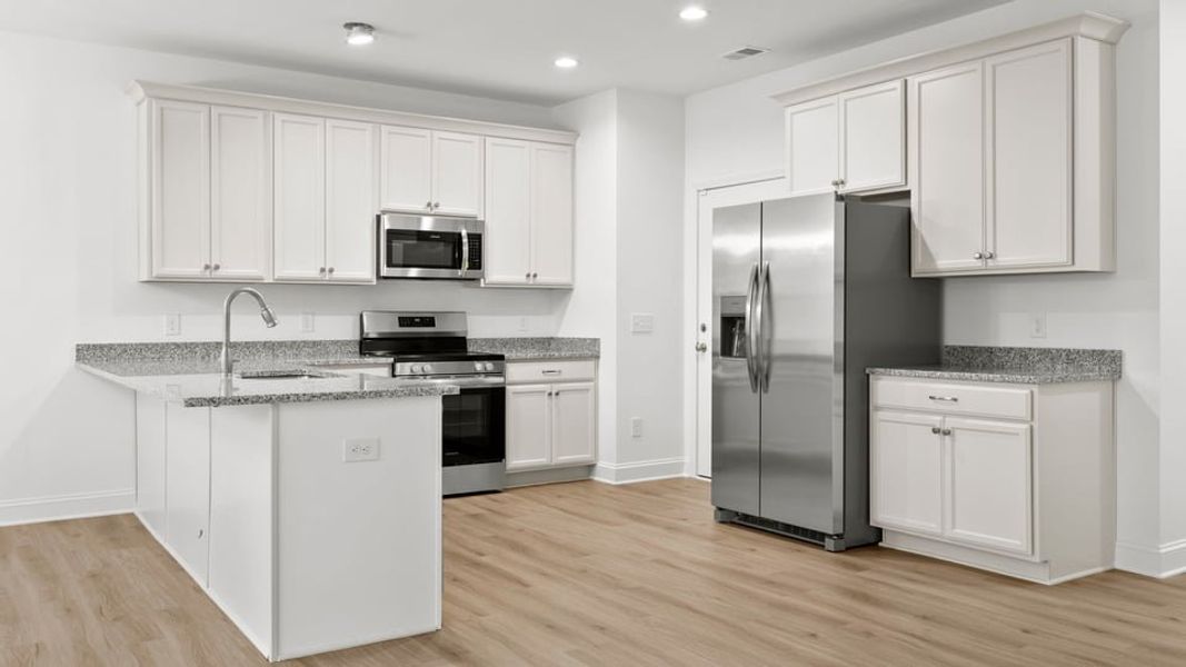 Representative furnished interior of a home built from the Interior Unit by D.R. Horton in Pearson Road Townhomes, Easley (Image 6).