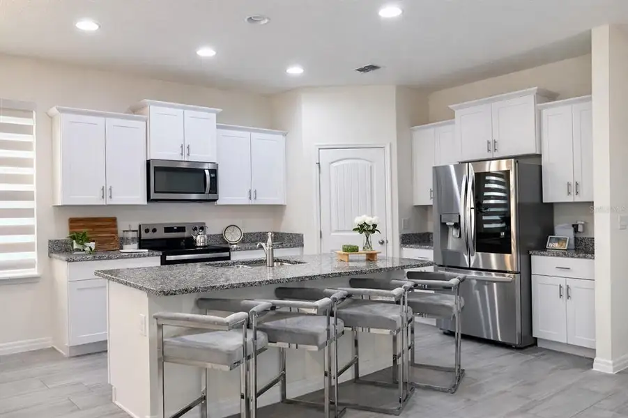 Furnished interior view inside a new home in Waterleigh, Winter Garden (Image 10).