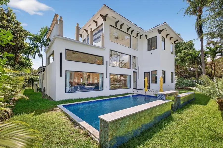 Exterior details and patio area of a home in , Biscayne Park (Image 3).