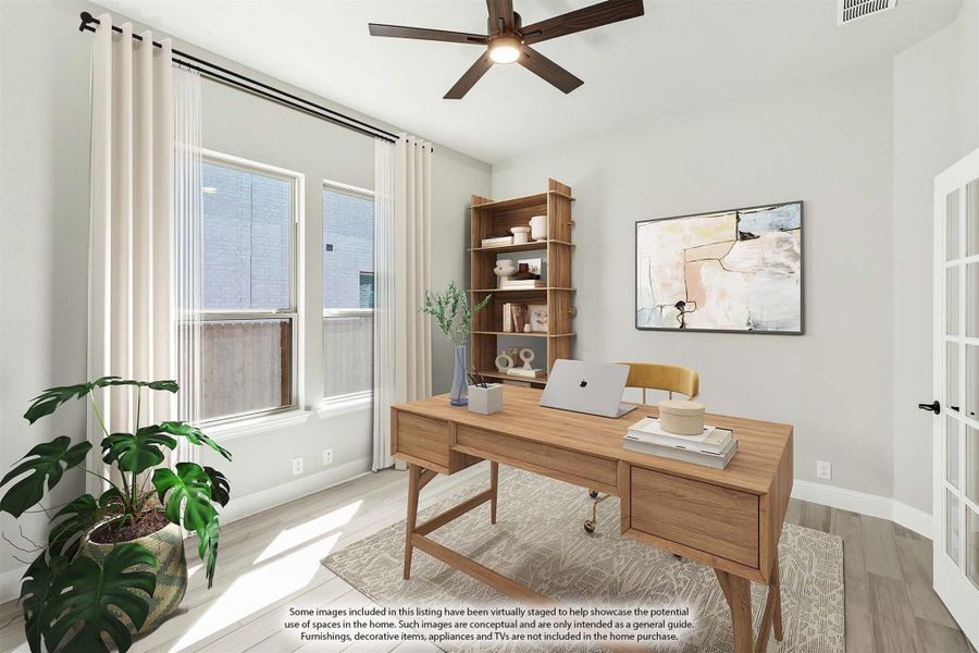 Home office with wood desk, ceiling fan, open shelving, and large windows with white curtains Home office with wood desk, ceiling fan, open shelving, and large windows with white curtains