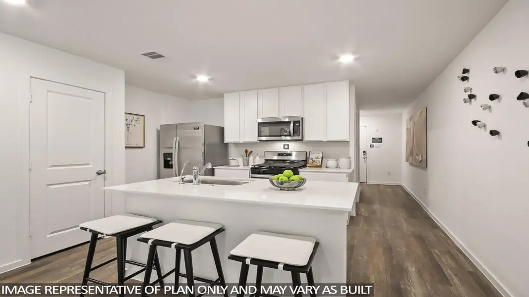 Furnished interior view inside a new home in Sunterra, Katy (Image 3).