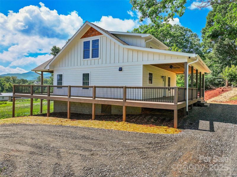 Front exterior of a new home in , Waynesville, NC, highlighting curb appeal (Image 17).