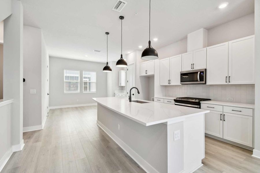 Representative furnished interior of a home built from the The Jana by David Weekley Homes in Apex at Seminole Heights, Tampa (Image 3).