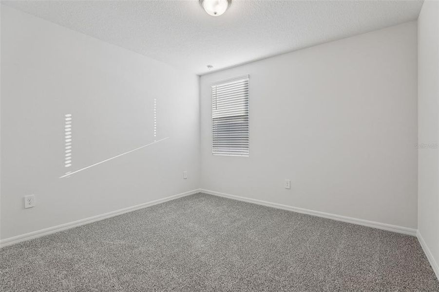 Spacious, unfurnished interior of a new home in Bradbury Creek - Signature Series, Haines City (Image 21).