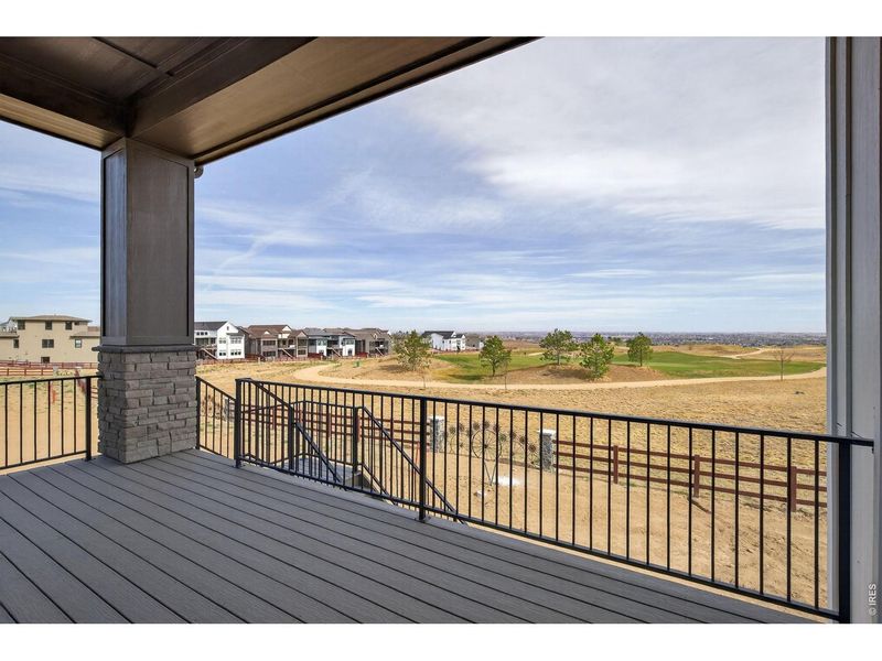 Exterior details and patio area of a home in RainDance, Windsor (Image 25).
