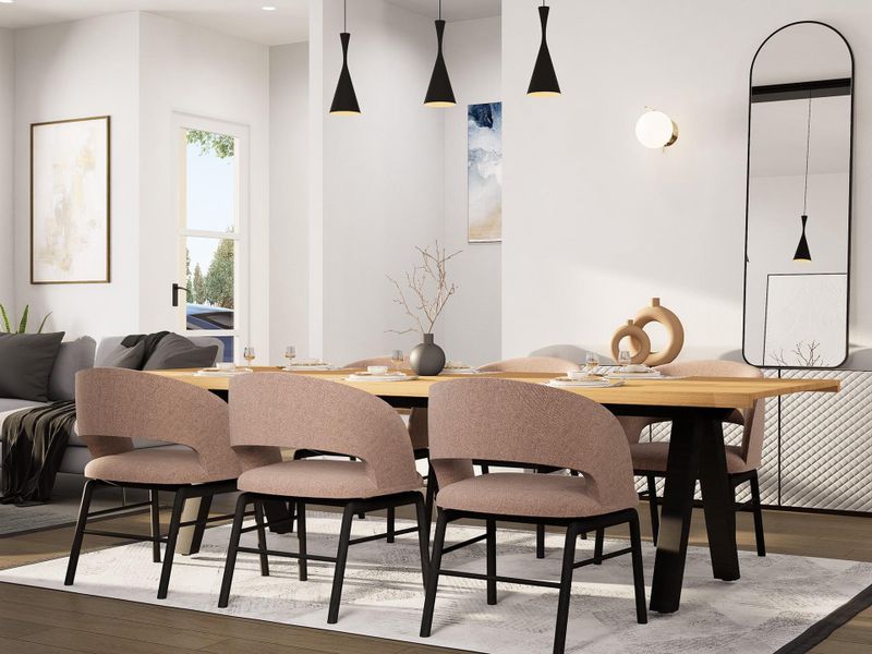 An elegant dining room highlighted by refined finishes and abundant natural light, offering a sophisticated setting that elevates both intimate dinners and grand entertaining.