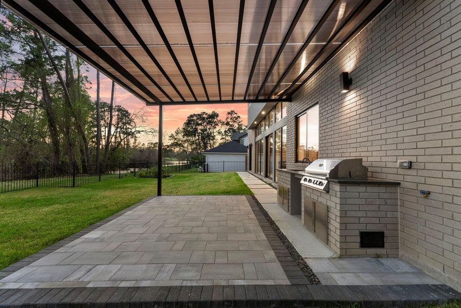 Exterior details and patio area of a home in , The Woodlands (Image 32).