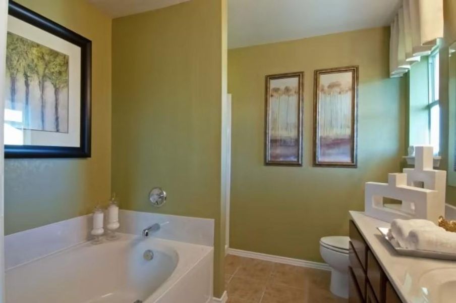 Photo of Centex model home with same floor plan, not of actual home listed.