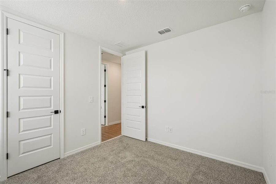 Spacious, unfurnished interior of a new home in Oakfield Trails - Signature Series, Parrish (Image 33).